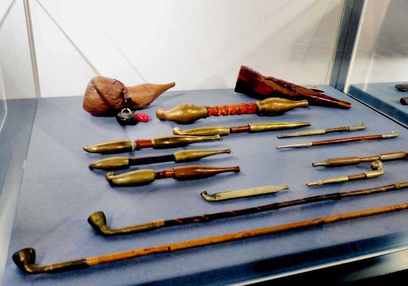 Display of kiseru, traditional Japanese pipes.