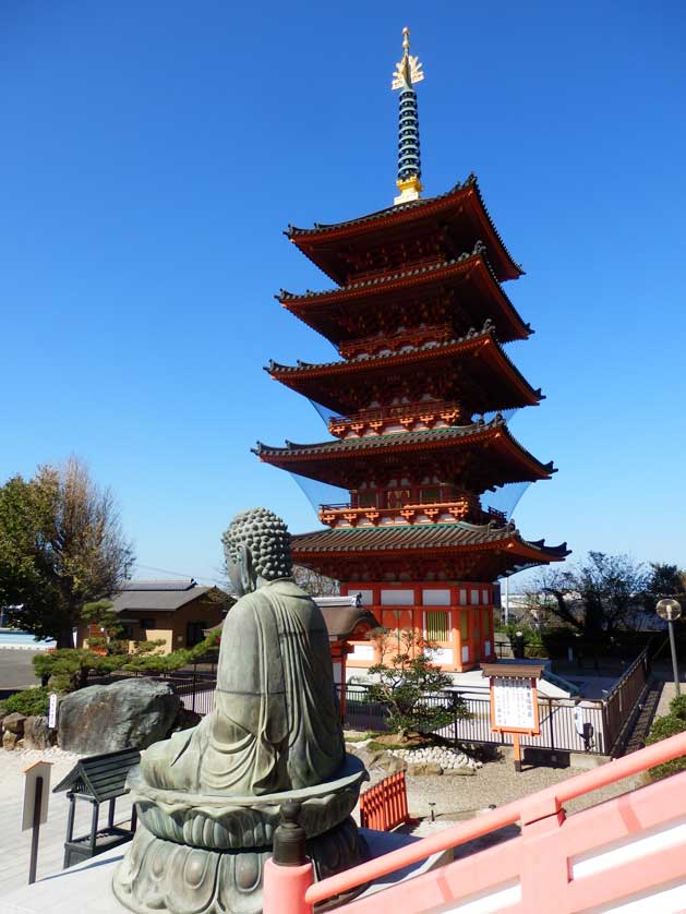 Pagoda and stone Buddha at Iinuma Kannon Temple, Choshi, Chiba Prefecture