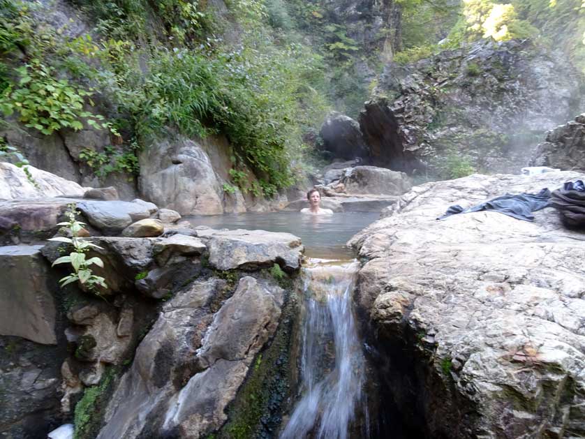 Enjoying an onsen experience in Japan.