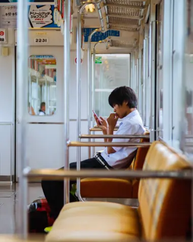 man sitting in the subway