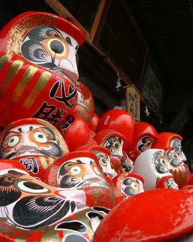 Daruma, a Japanese papier-mâché figurine in the shape of a Buddhist monk.