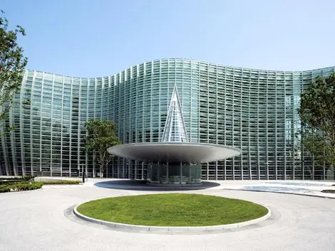 As an architectural ripple, the facade of the National Art Center Tokyo was designed by Kisho Kurokawa.