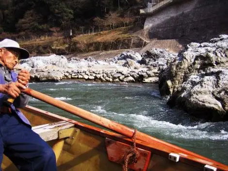 Three men driving each boat to the sheer force of their arms as well through the rapids and calmer stretches.