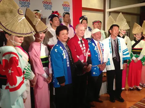 The mayor of the fourth arrondissement of Paris, Christophe Girard, surrounded by dancers Awa Odori at the Embassy of France in Japan.