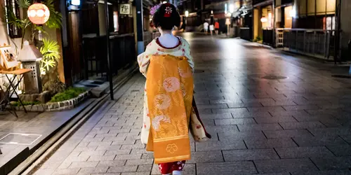 A geisha walking in Gion, Kyoto old town
